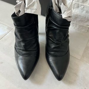 ALDO black genuine leather ankle boot/booties 3 1/2 inch heel, size 7.